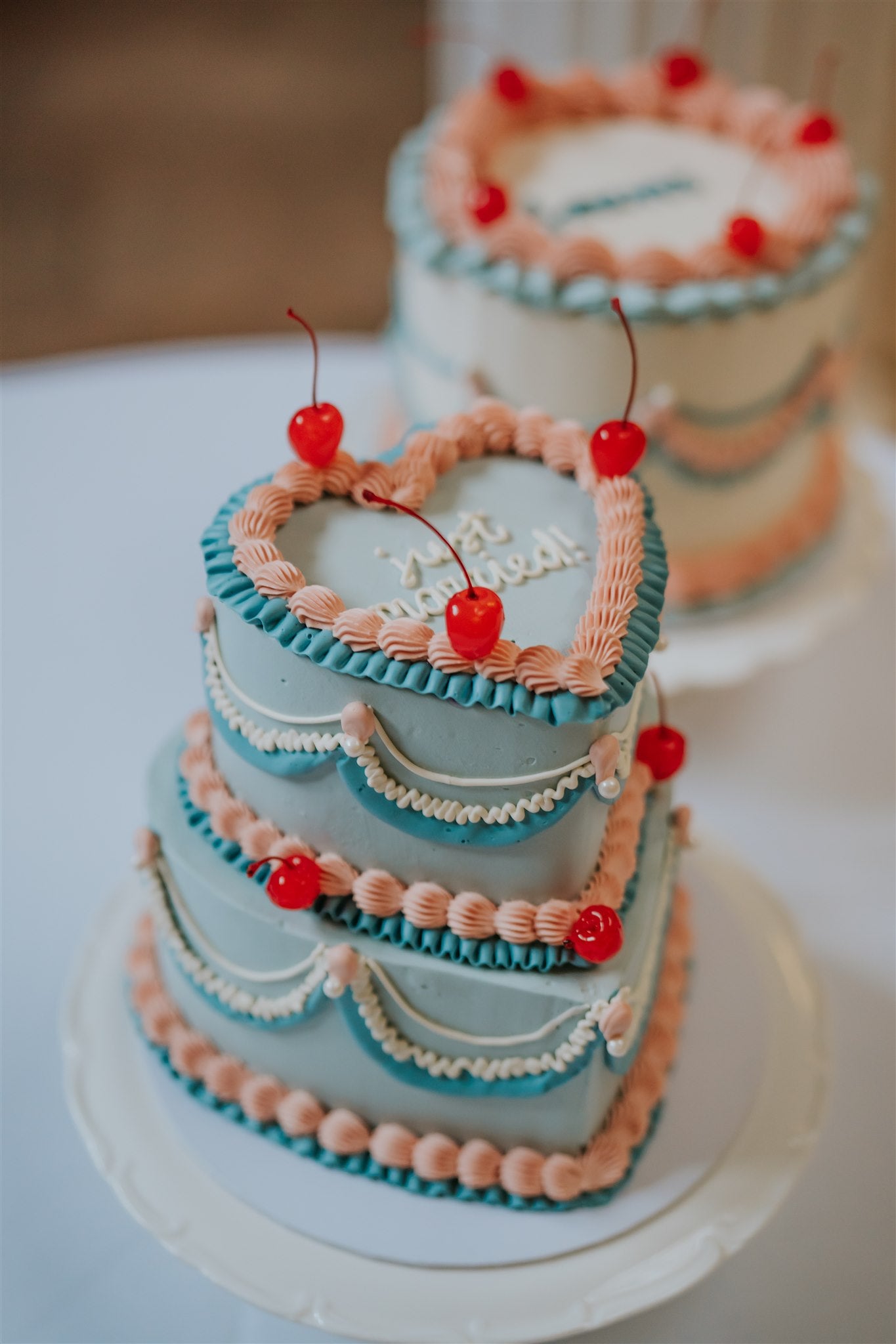 Heart shaped blue and peach vintage cake created by Pastel by Rachel. Wedding cakes Ireland. Wedding cakes Northern Ireland